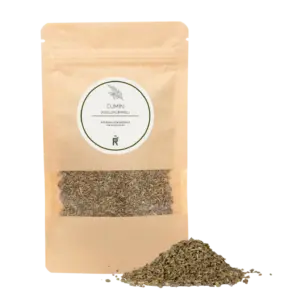 Das Bild zeigt einen Haufen Kreuzkümmel vor einer Verpackung.